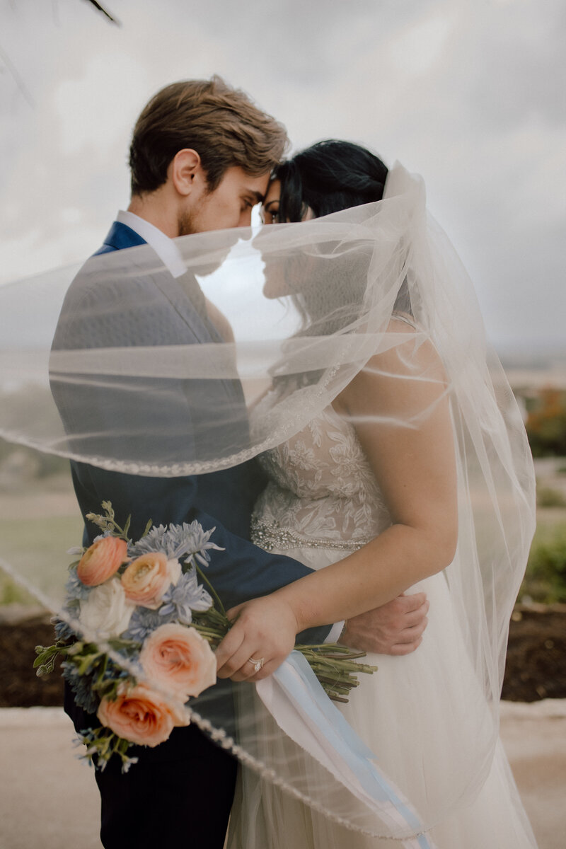 Photos by Tia is a wedding, elopement, engagement, and creative session photographer based in Austin, Texas. She offers both digital and film photography services.
