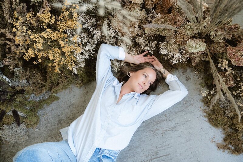 Holistic approach to menopause—Vanessa practicing mindfulness and grounding techniques in nature for hormone balance