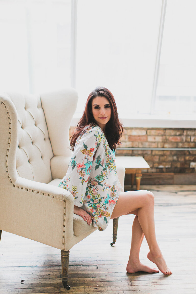 Boho chic boudoir session with floral robe.