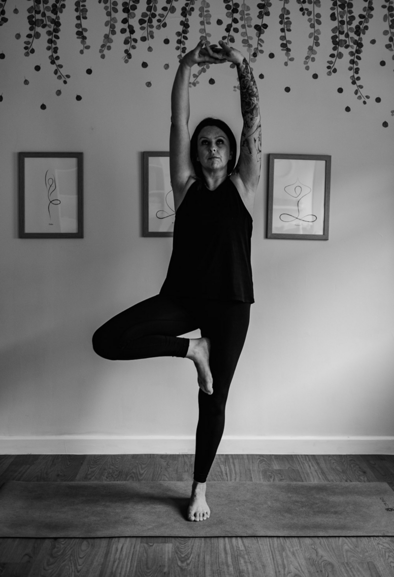 Image of Nat Winterson in a yoga pose at Studio Eight yoga and pilates studio in Wells, Somerset