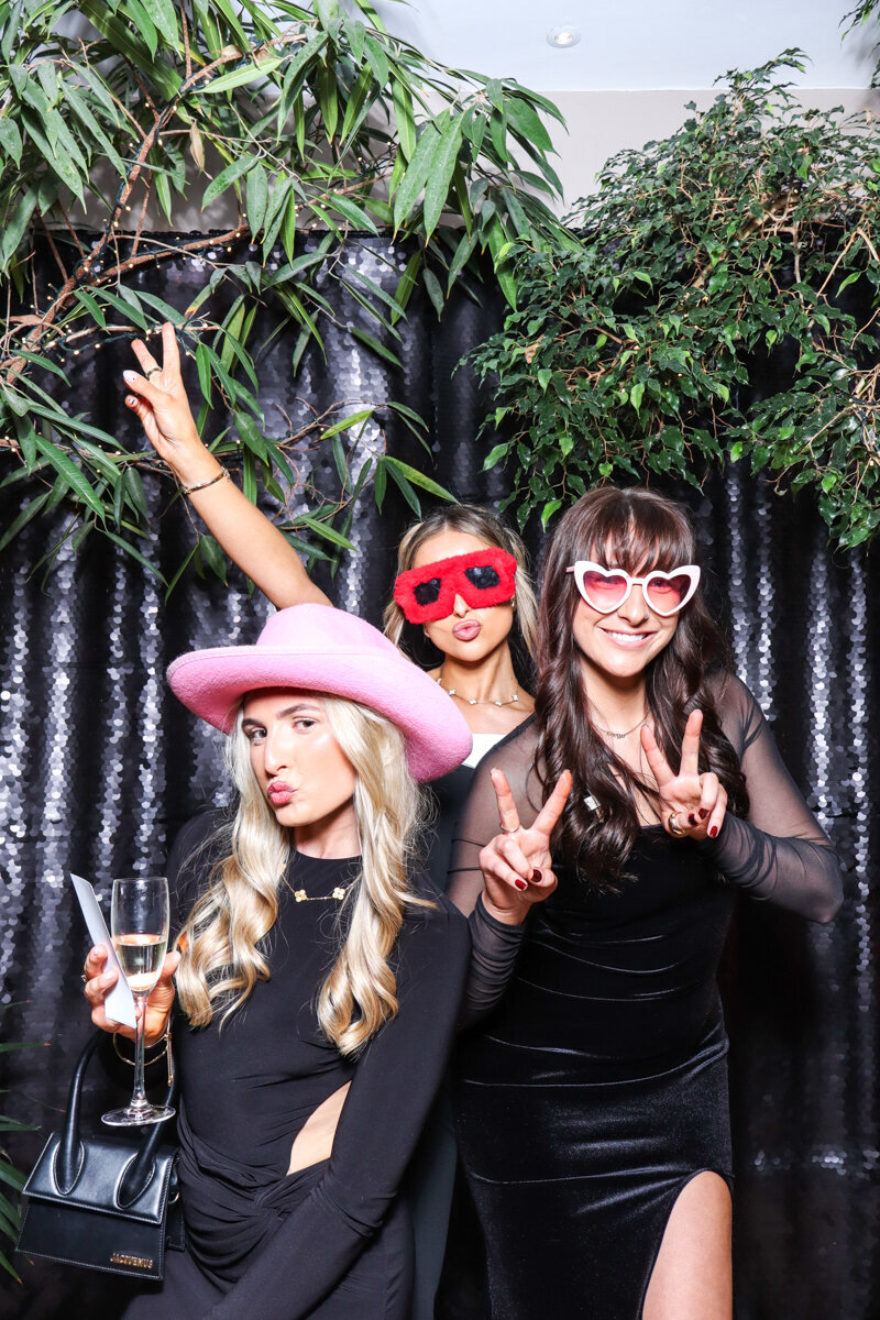 3 guests posing for the Best  Premium Photo Booth for weddings , corporate events, birthday parties in Gloucester