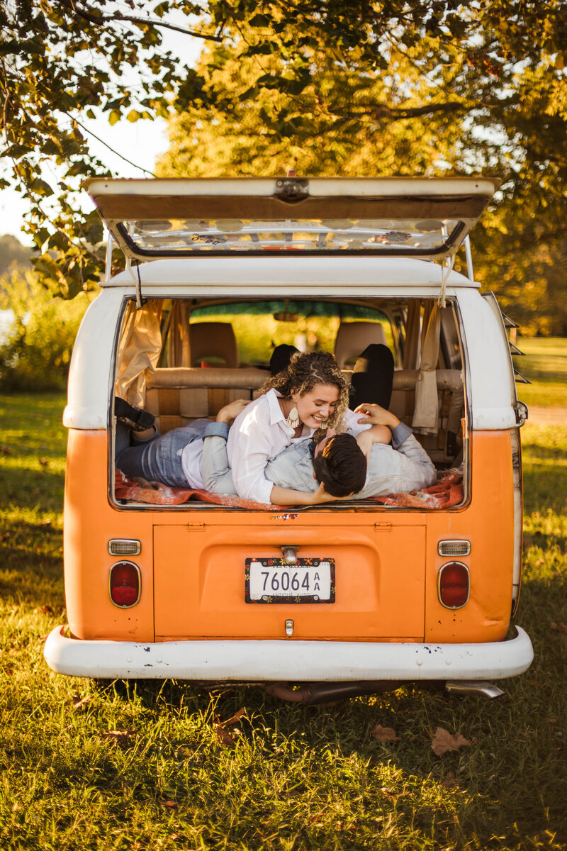 couple sitting in the back of old van during nashville session
