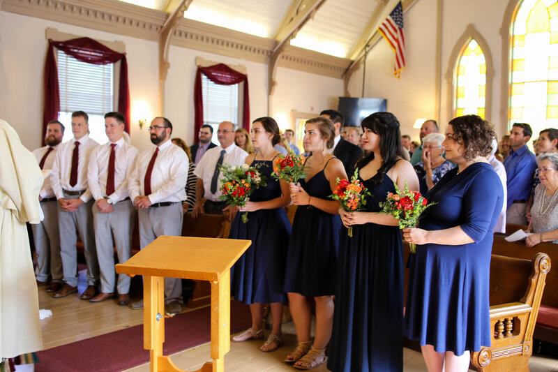 Everyone standing during ceremony | Wedding Photography