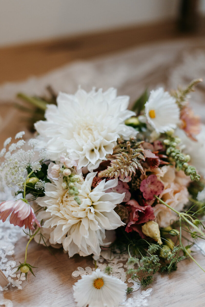 new jersey wedding photo by Blooming Faith Photography of brides bouquet. White, pink, beige flower arrangement