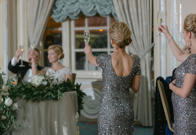 Two Bridesmaids toast to wedding couple at Fairmont Copley Plaza.