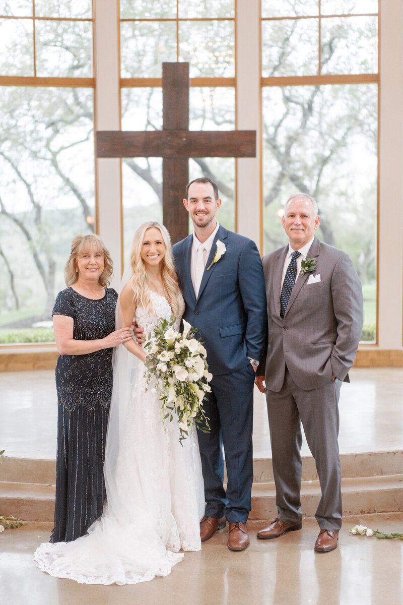 Family portraits at Canyonwood Ridge with Hill Country backdrop