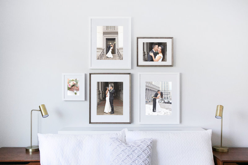 wall gallery with photos of couple getting married at city hall in NYC