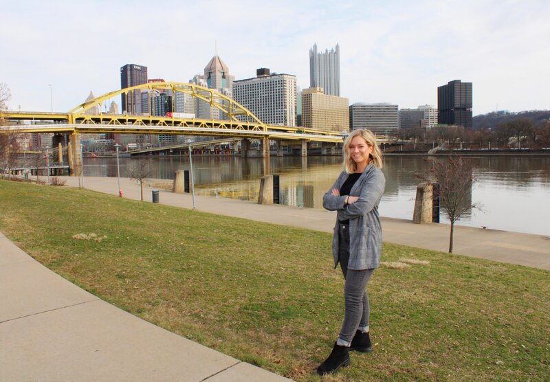 Marketing Owner of OTTY Marketing in front of the city of Pittsburgh.