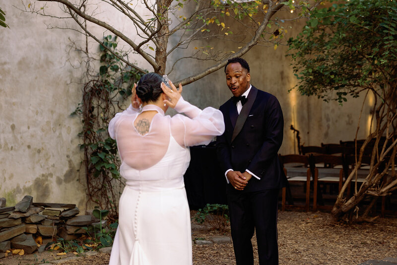 bride and groom first look at city wedding in pennsylvania