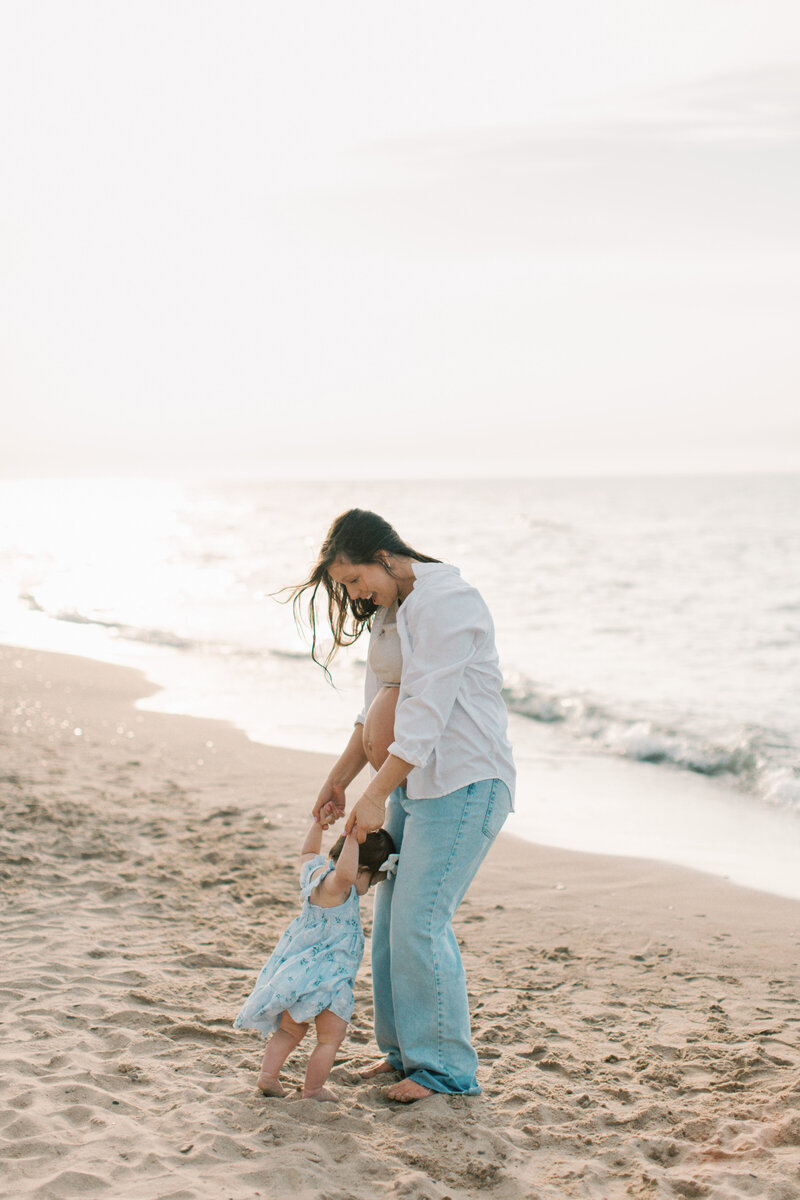 mother and her daughter at the beach