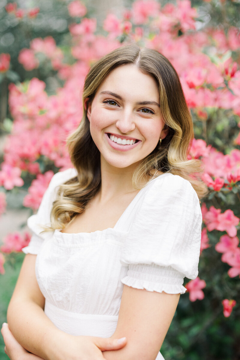 High school senior posing at the UL Alumni Center during their senior session, captured on film by Morgan Alysse, Louisiana film photographer.