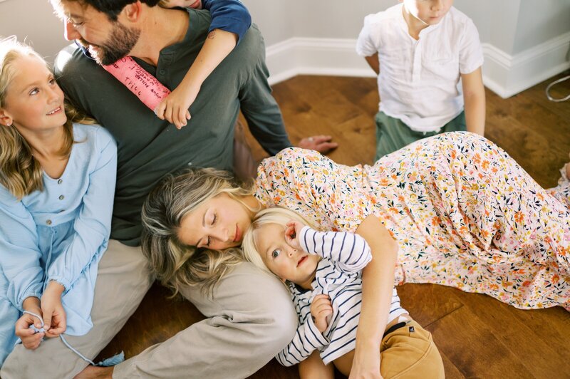 Family in Franklin TN laying on the floor together