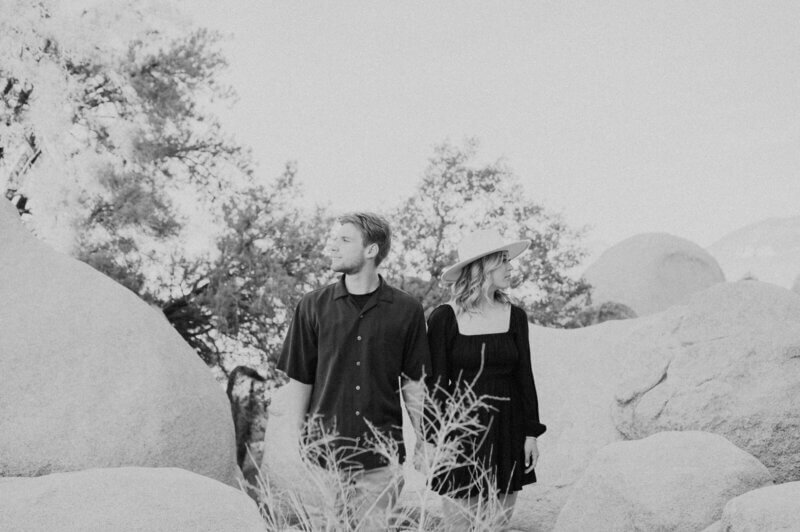 black and white photo of couple wearing black by nashville engagement photographer
