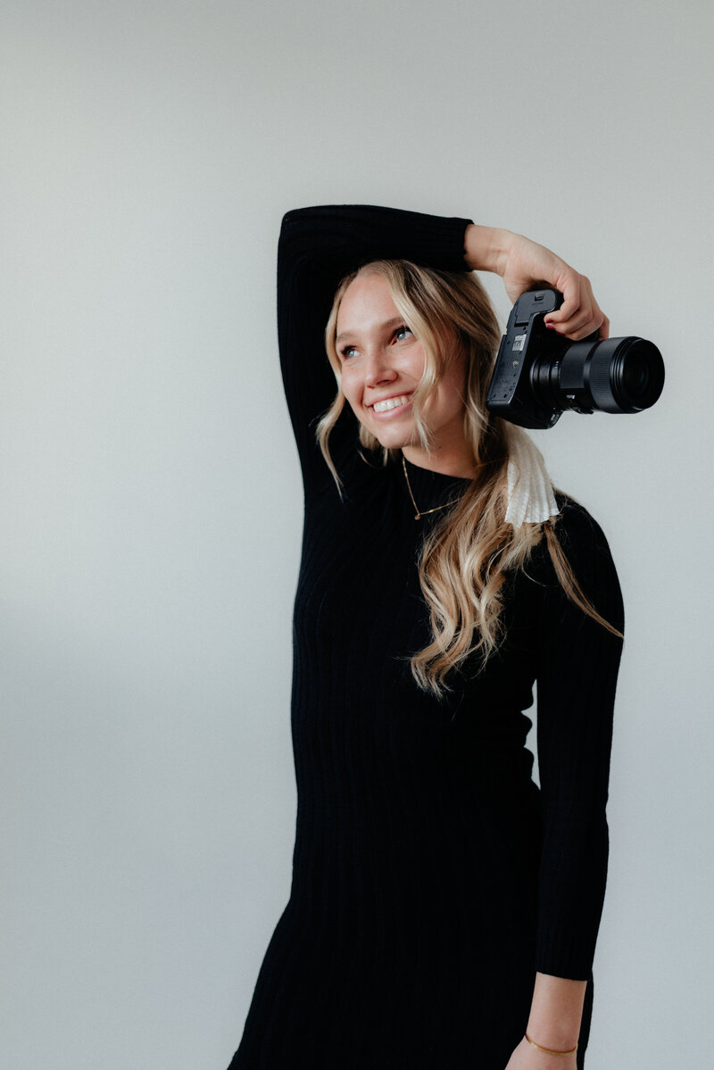 Photographer headshot in white studio