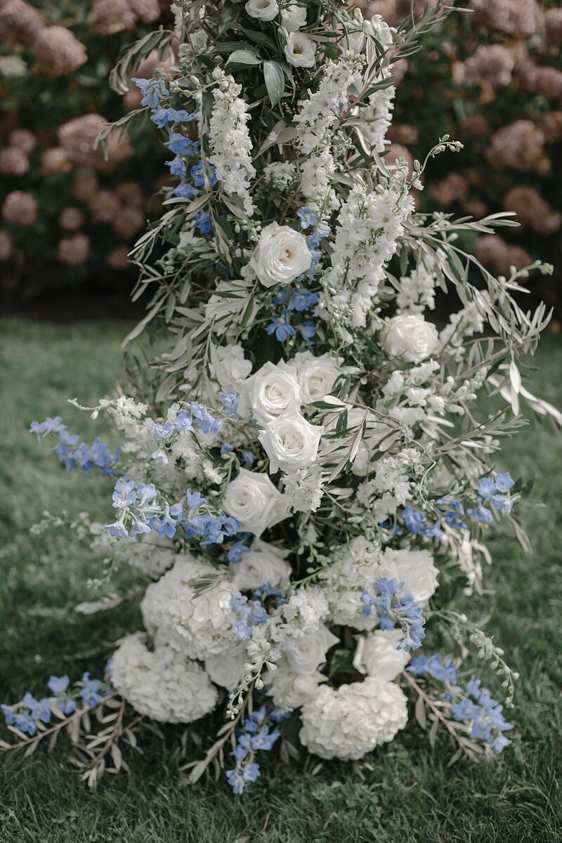 White florals ceremony decor. Maine wedding.