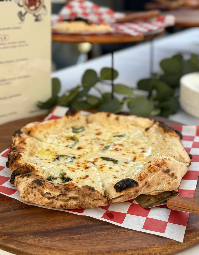 alfredo sauce style neapolitan pizza for a catering event