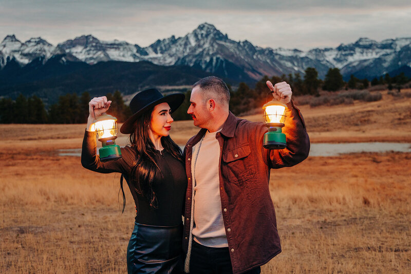 Engaged Couple with lanterns in Ridgway Colorado