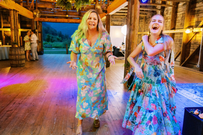 Happy wedding guests attending a wedding at North Carolina venue Paint Rock Farms.