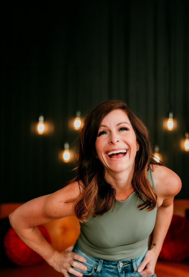 Shannon O'Malley, Twin Cities online dating photographer, smiling during lifestyle session
