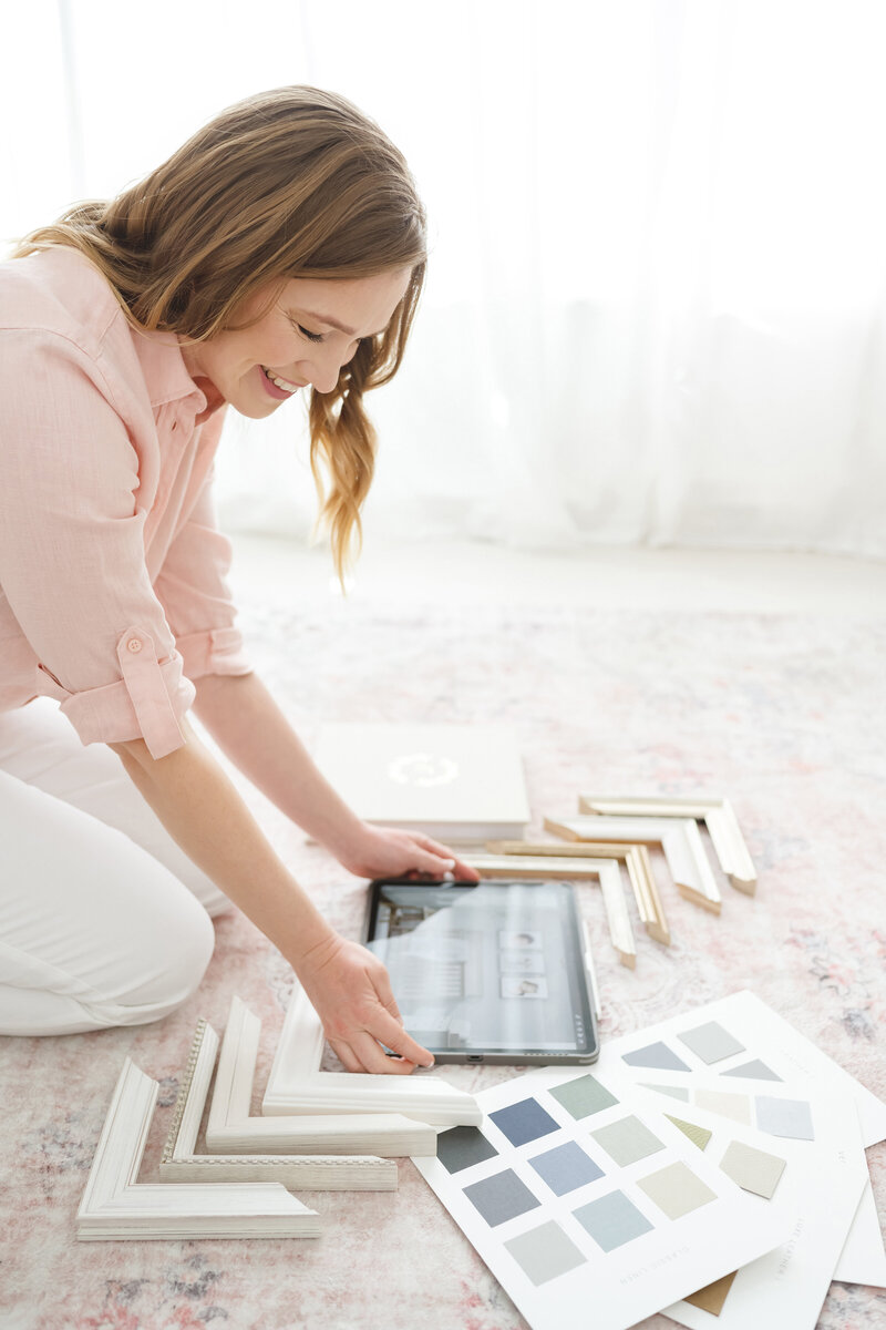 Northern Virginia Photographer Stephanie Honikel with framing supplies