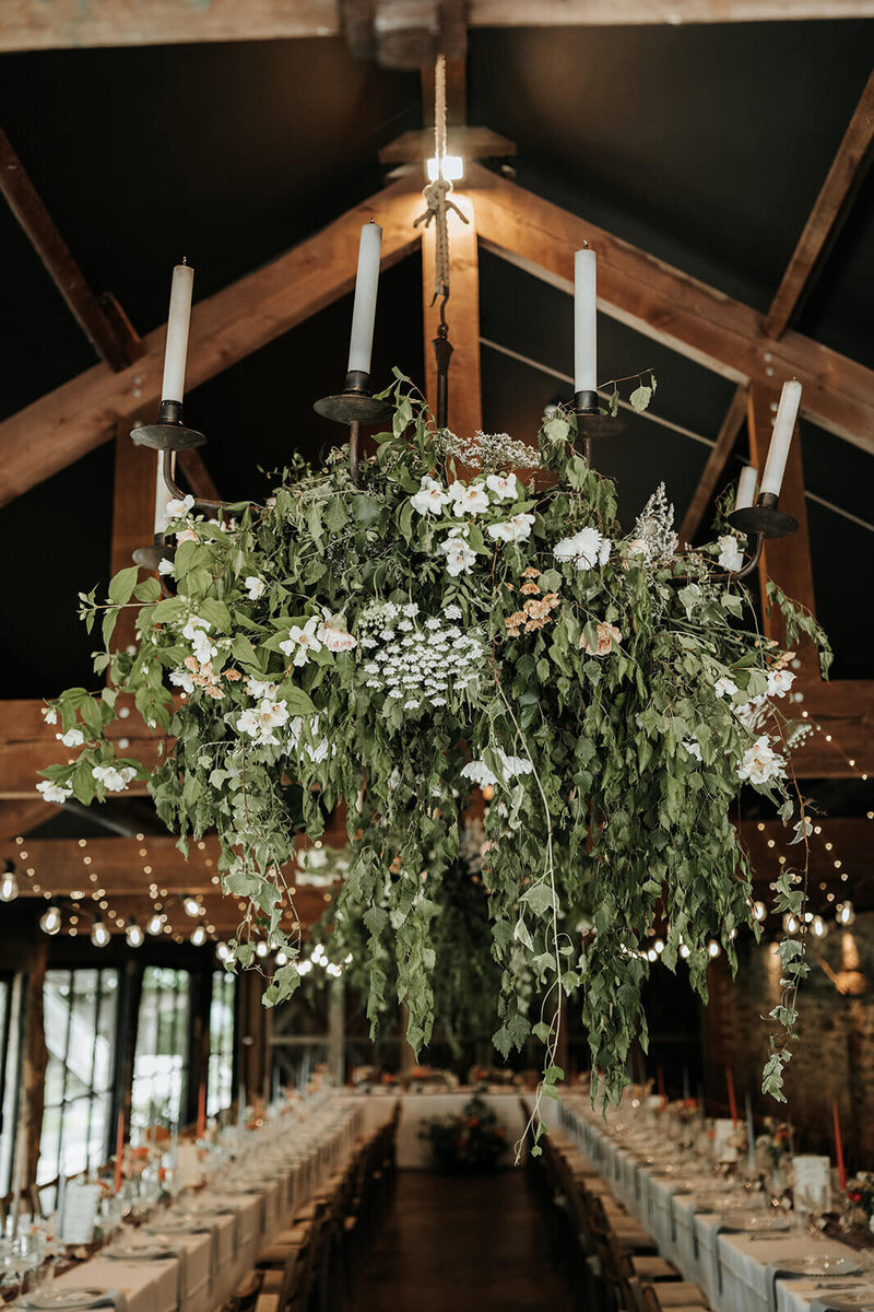 Hanging flowers for the wedding breakfast at Dewsall Court
