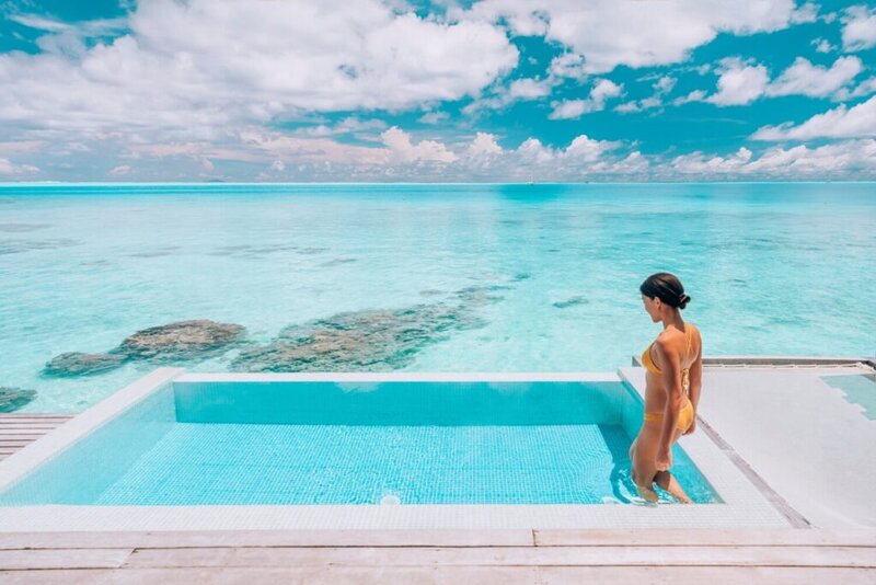 Overwater bungalow with a pool in Bora Bora