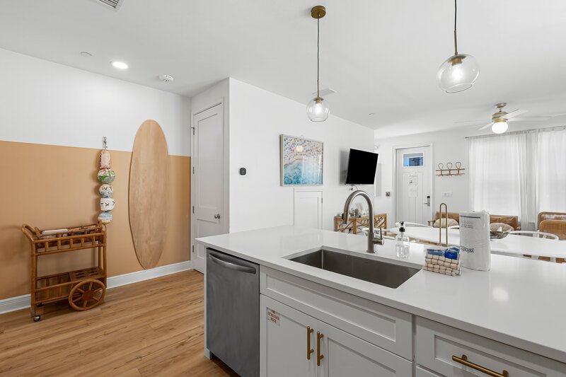 Spacious open-concept kitchen and living area at Beach Cabana, a family-friendly Panama City Beach vacation rental near 30A and Santa Rosa Beach.