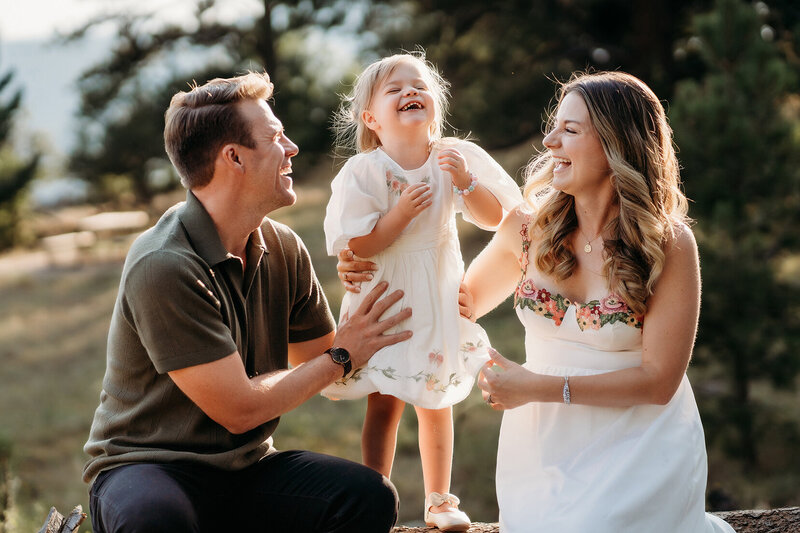 Denver Family Photographer captures family laughing during outdoor family photos