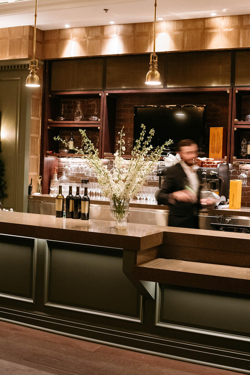 motion blur of man walking at reception