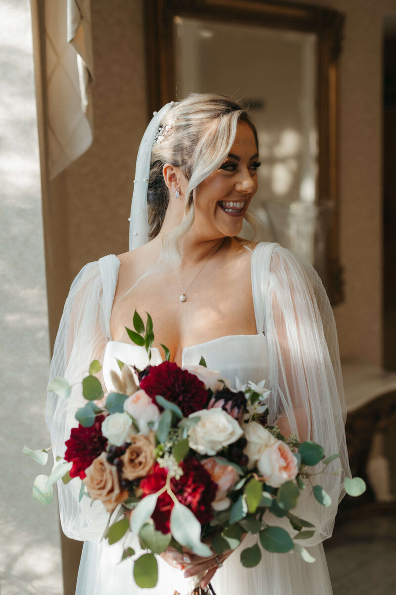 A bride and her beautiful wedding day floral bouquet