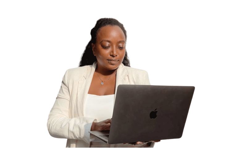 Founder of Otterly Creatives, holding a laptop and bringing playful yet strategic web design to life.