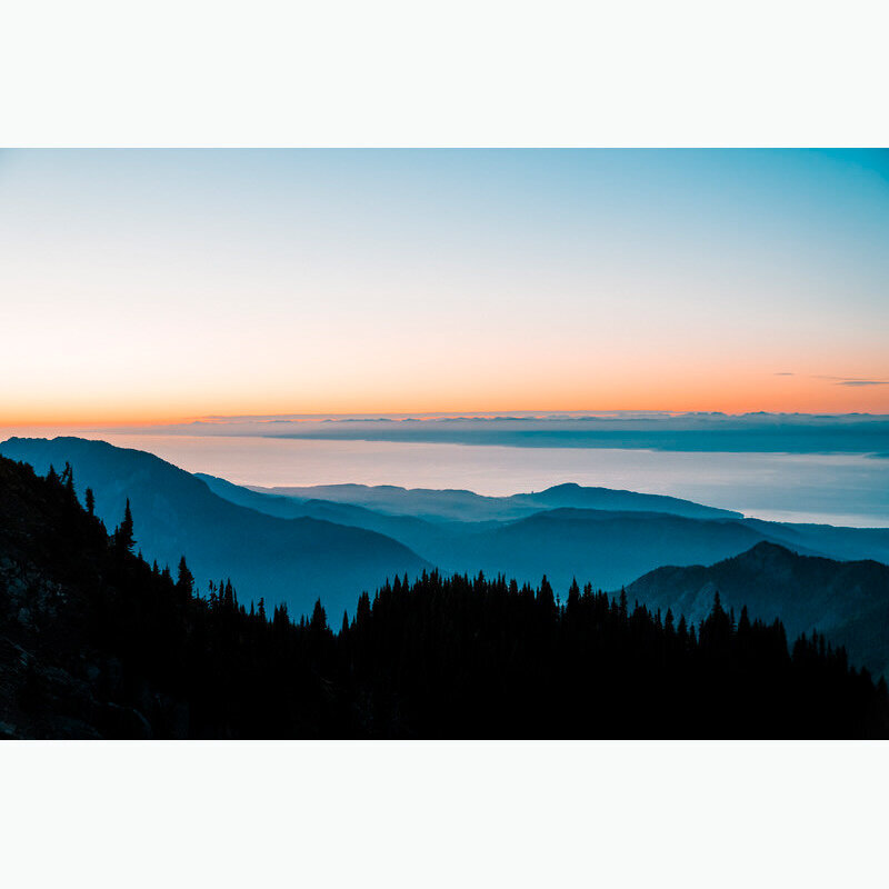 The sun setting over the Strait of Juan de Fuca as seen from Hurricane Ridge in Olympic National Park