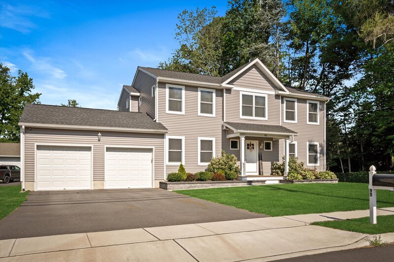 Tan Exterior of Center Stair Colonial in Hamilton, NJ