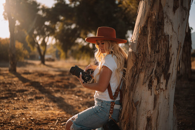 woman holding camera