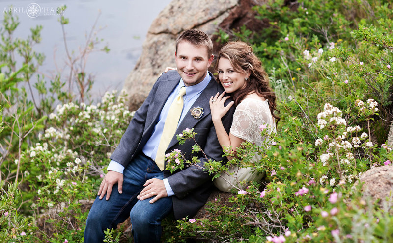 Summer wedding photo in the wildflowers at Lily Lake in Estes Park Colorado