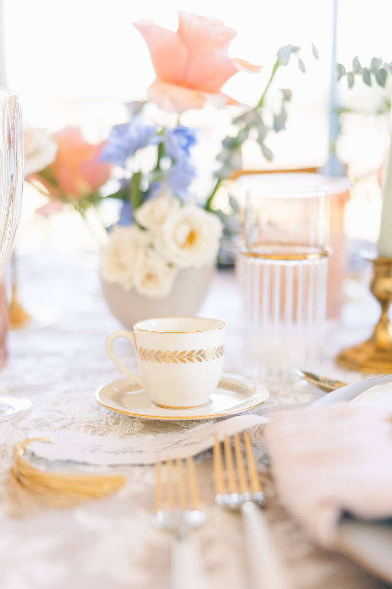 charming table setup with flowers and teacup