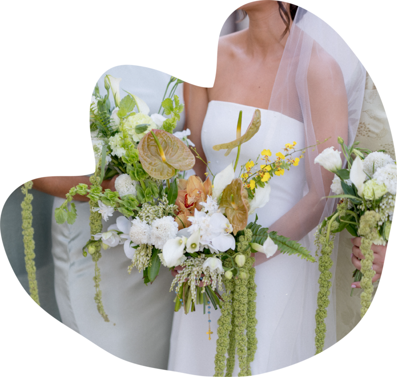 Elegant bridal bouquet featuring lush white florals and greenery, designed for a Central Texas wedding with a sophisticated, organic aesthetic.