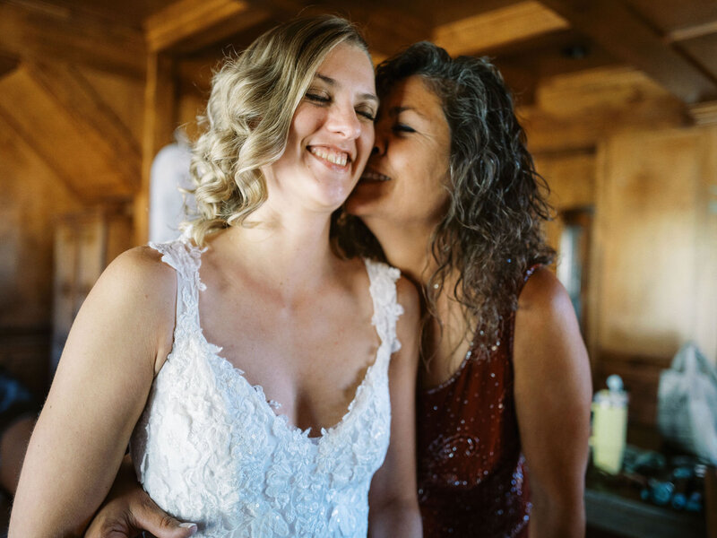 Mother of the bride laughs.