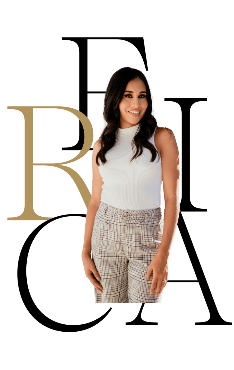 erica de los santos celebrity nail tech wearing white top and plaid pants looking and smiling at the camera