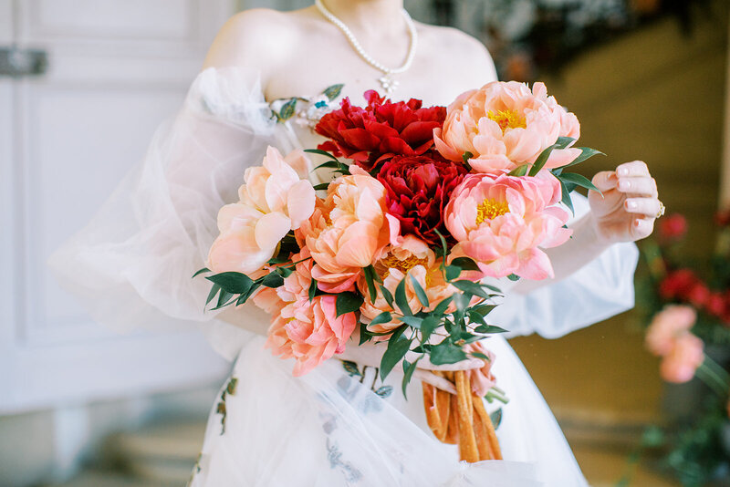 Houston wedding photography bridal portrait holding the red bouquet. 