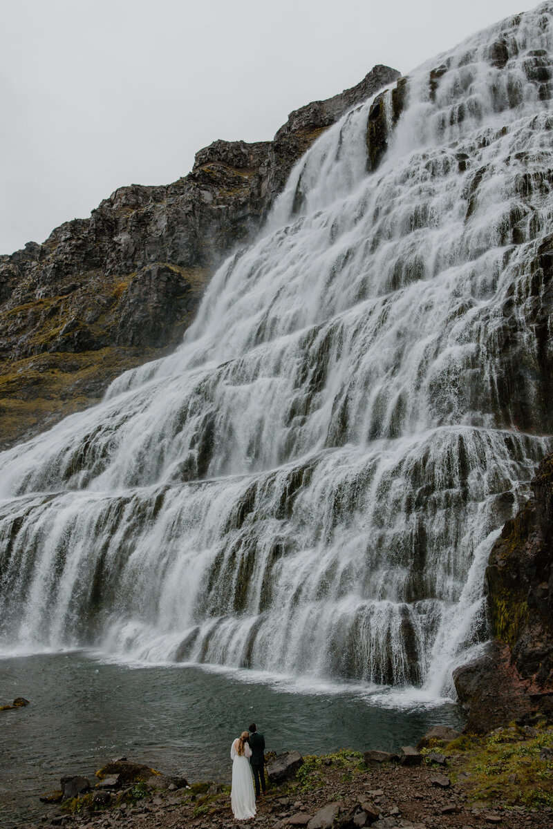 Reynisfjara Black Sand Beach Elopement with bride and groom on basalt columns.