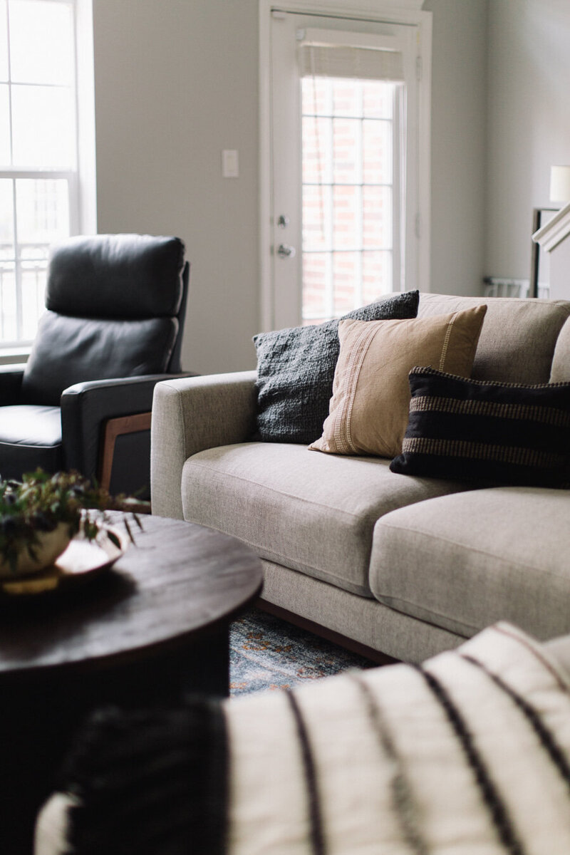Art-forward, masculine living room, designed by Hope Miriam Designs in DFW