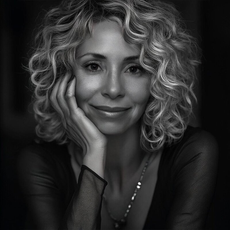 Lidia Ranieri, retreat facilitator and coach combining corporate experience, psychological mastery, and astrological wisdom for transformative group experiences