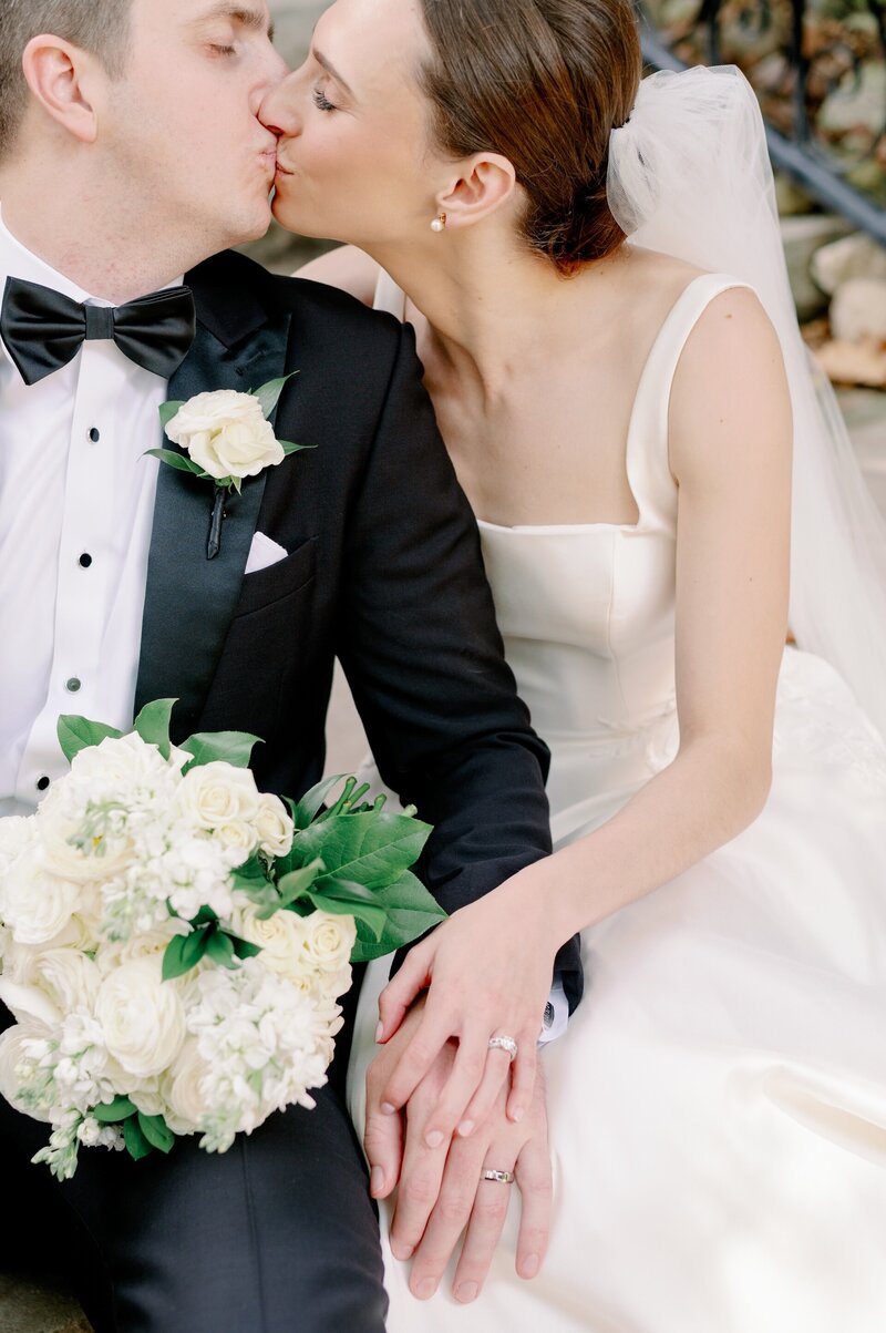 bride and groom holding hands