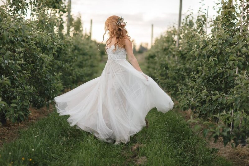 Bride twirling in her drass