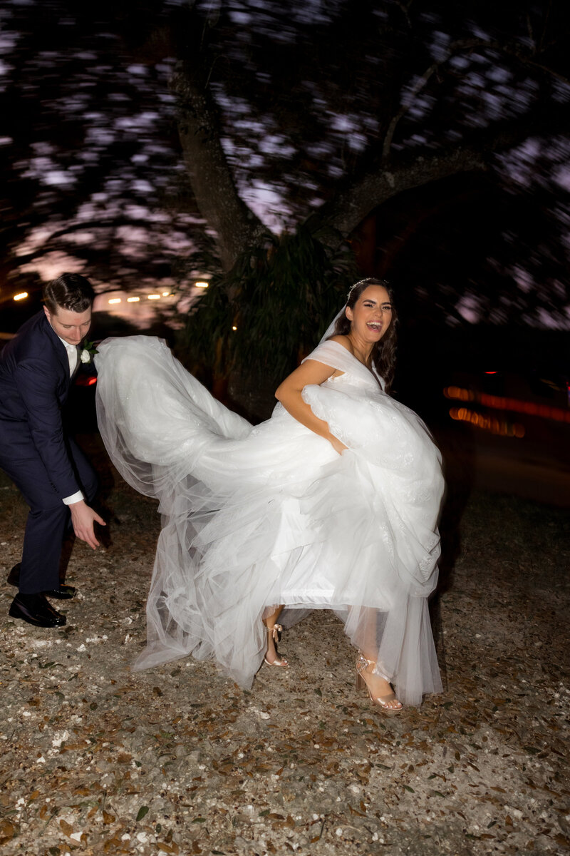 bride-and-groom-running-away