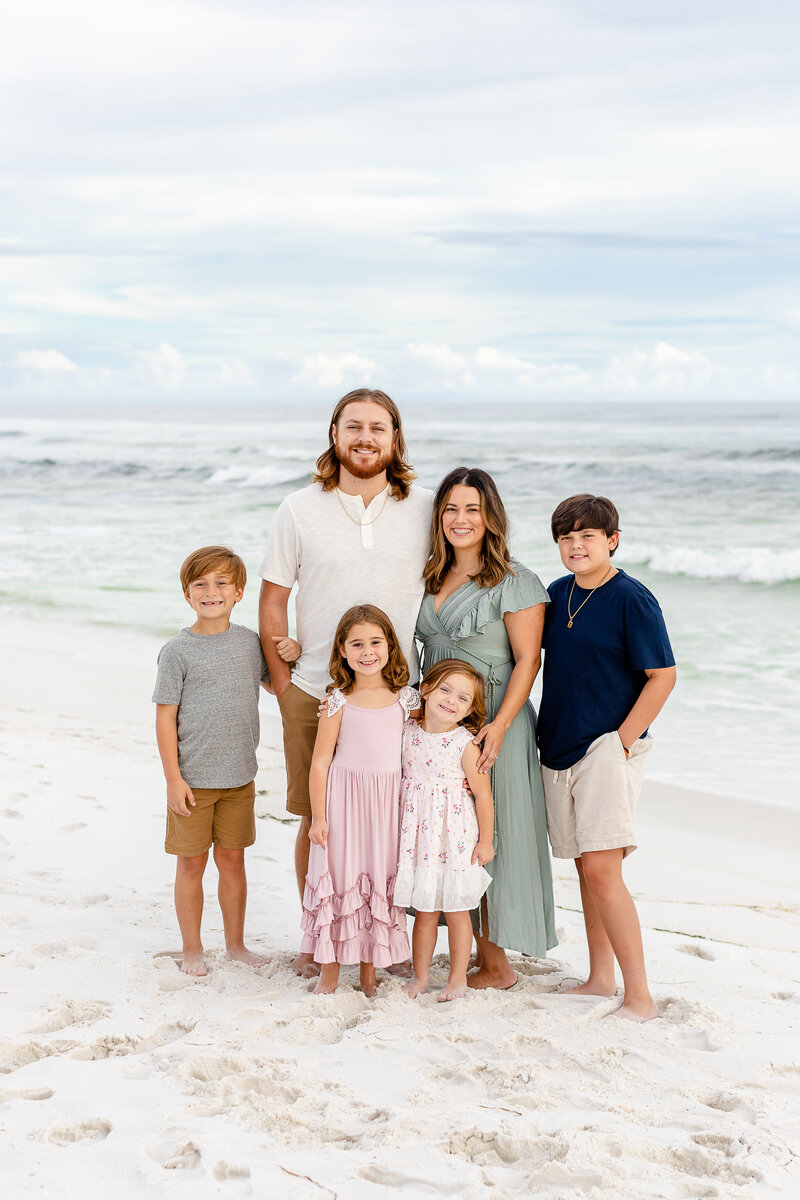 Family of 4 on the beach in Virginia Beach, VA
