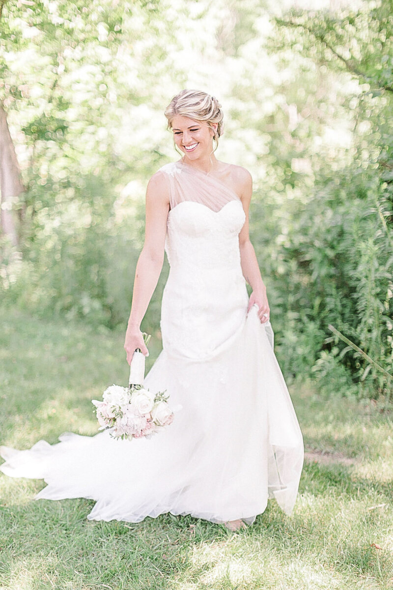 Smiling Bride with Bouquet