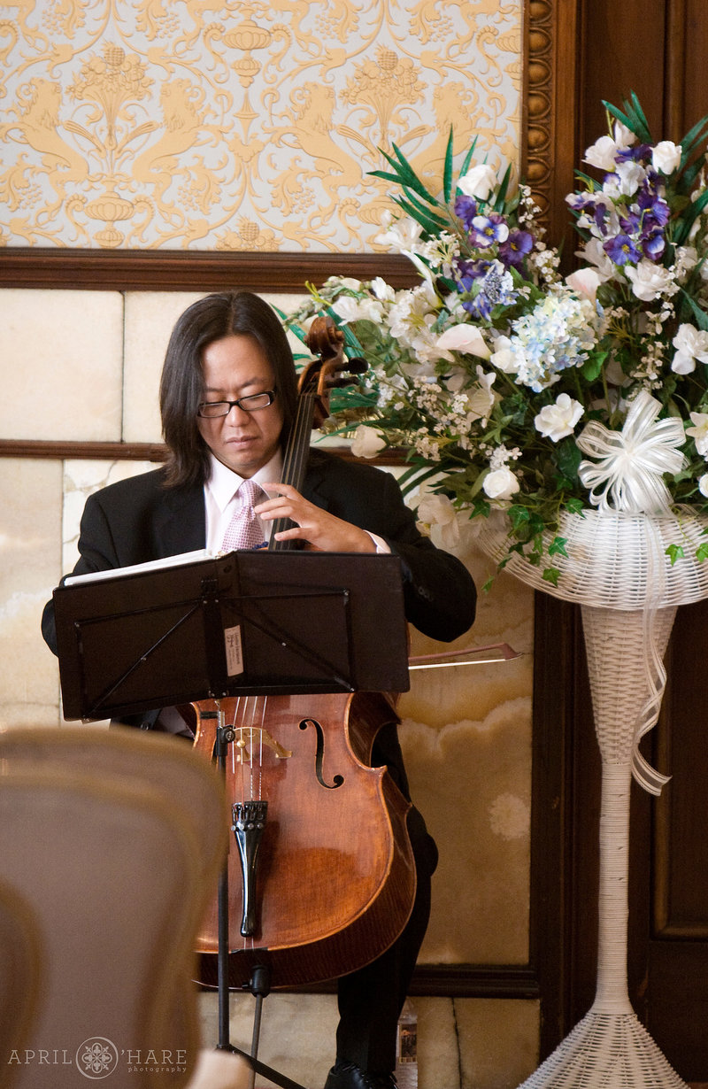 Musician set up for a ceremony inside the Brown Palace Hotel's Onyx Room in Denver CO