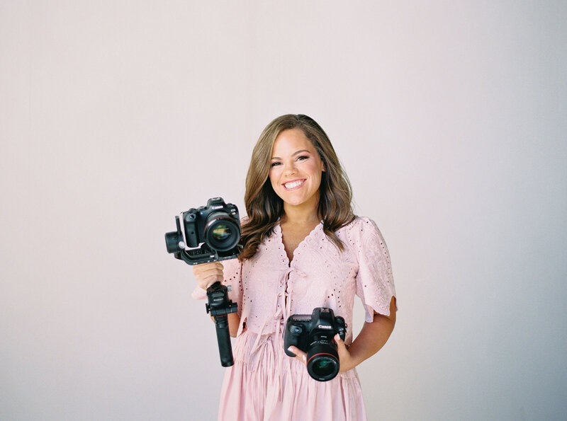 Claire Hodges holding a camera